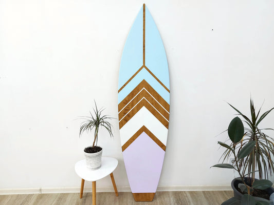Decorative surfboard with chevron pattern