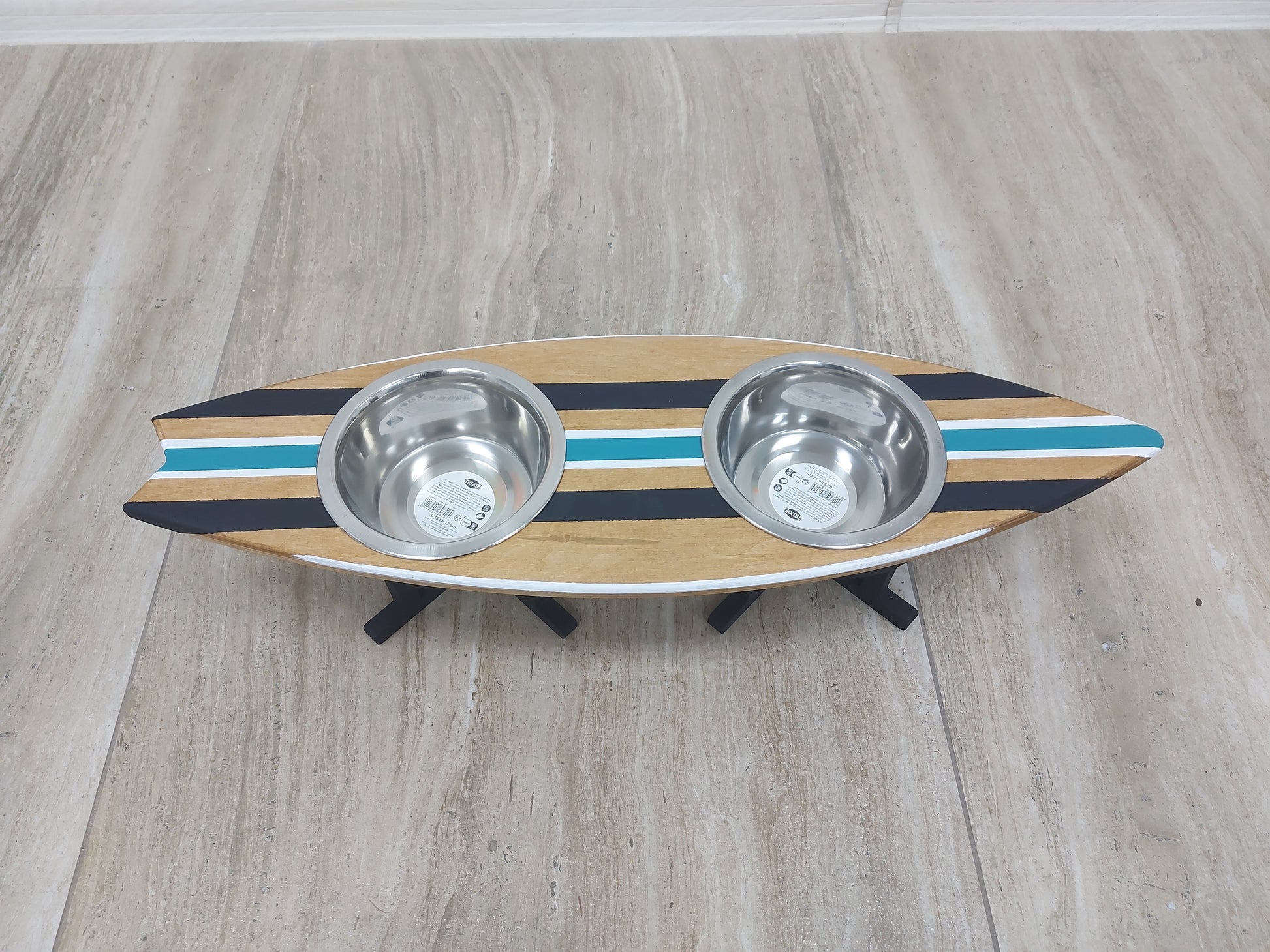 Surfboard-shaped wooden bowl stand with stainless pet bowls