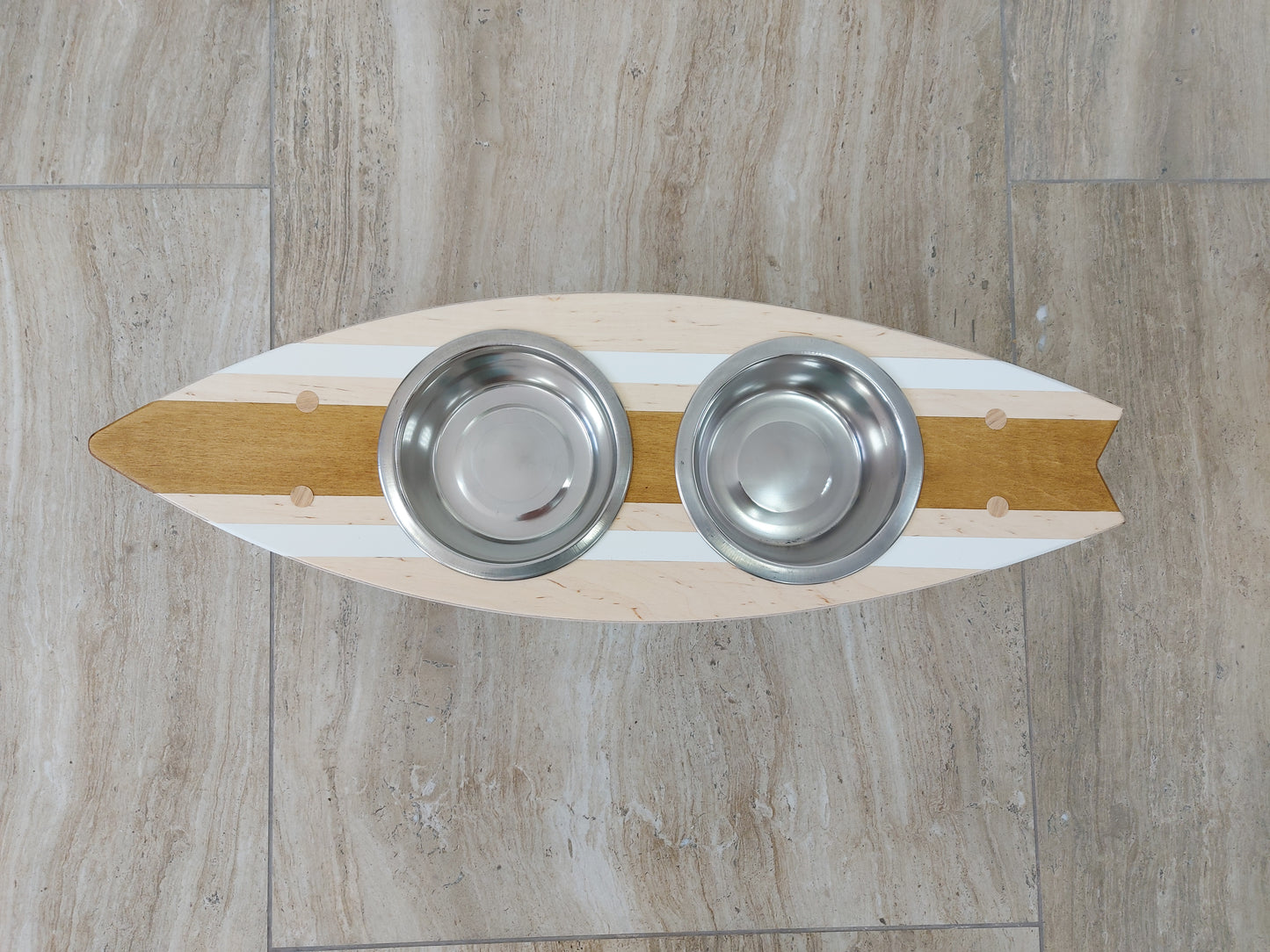 Close-up of custom painted on personalized surfboard pet feeding bowl holder