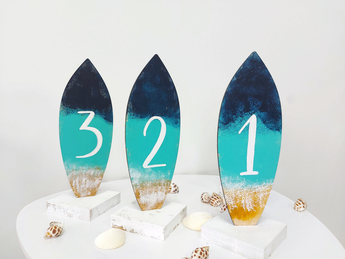 Coastal interior wooden table numbers for seaside reception