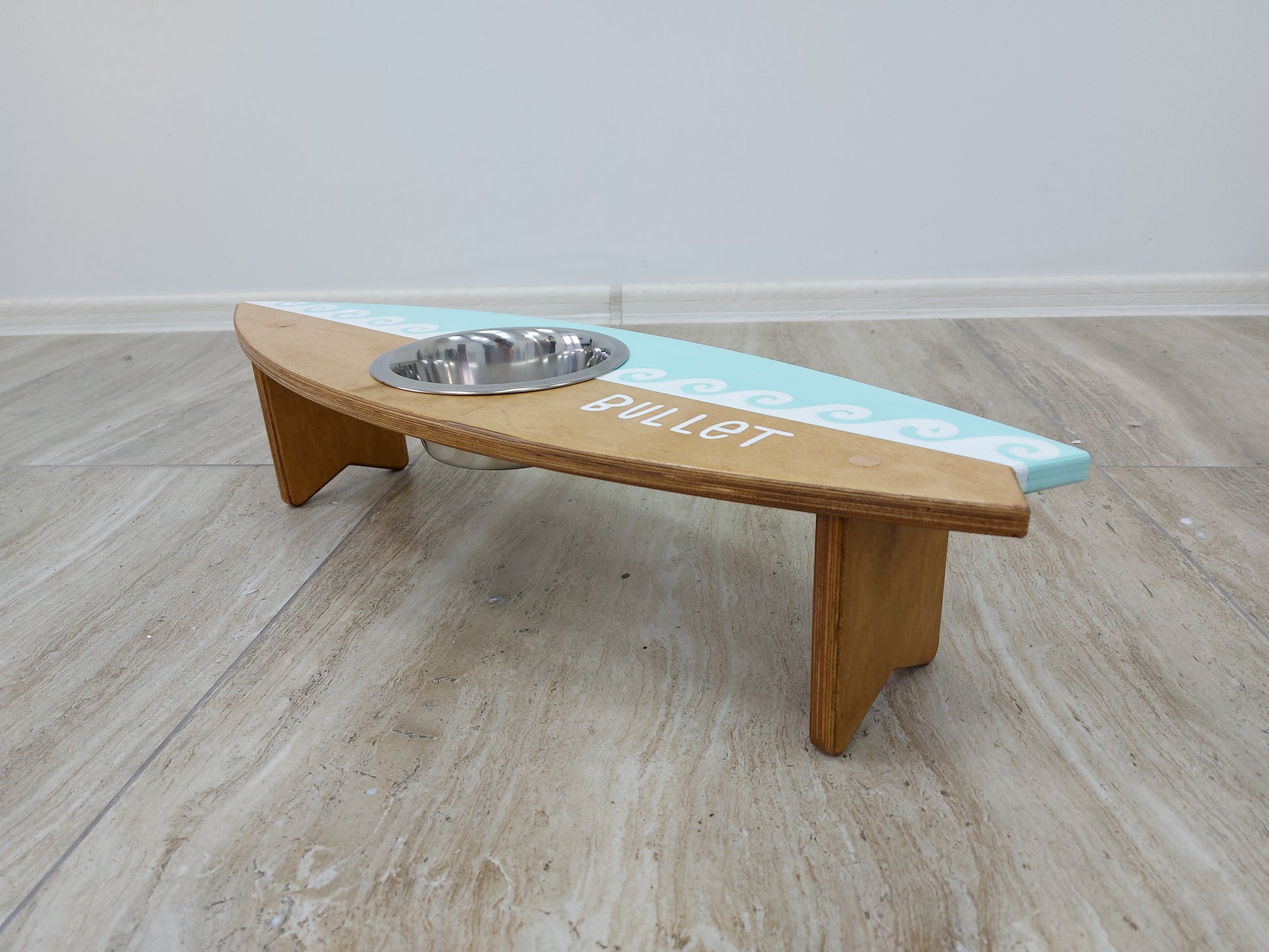 Wooden surfboard dog bowl stand holding stainless pet bowls