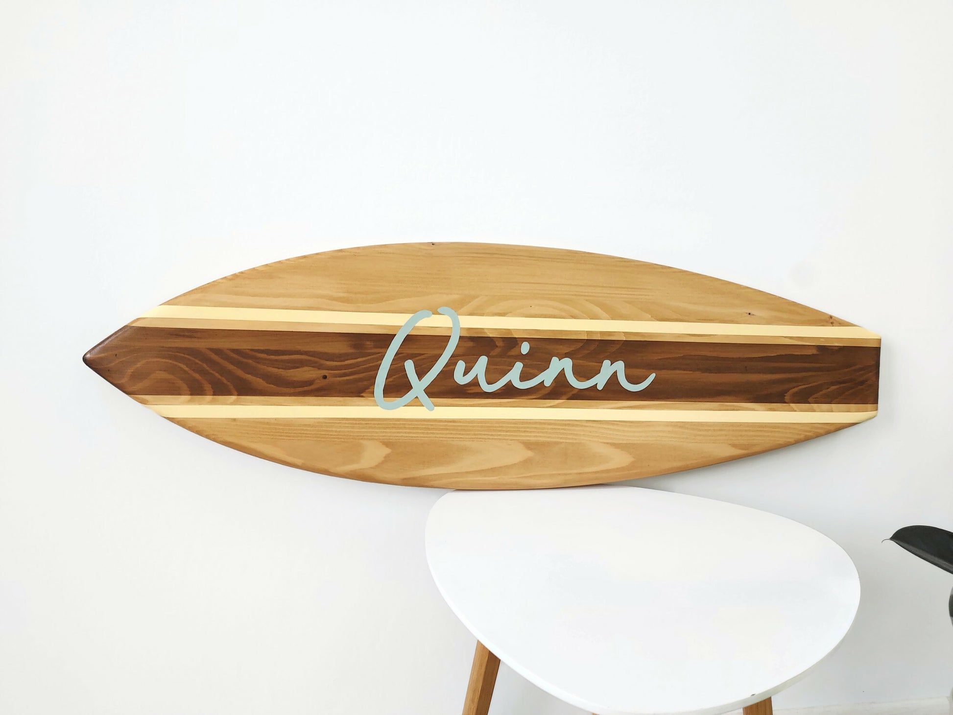 Artisan-crafted wooden name sign for coastal-inspired kids’ room