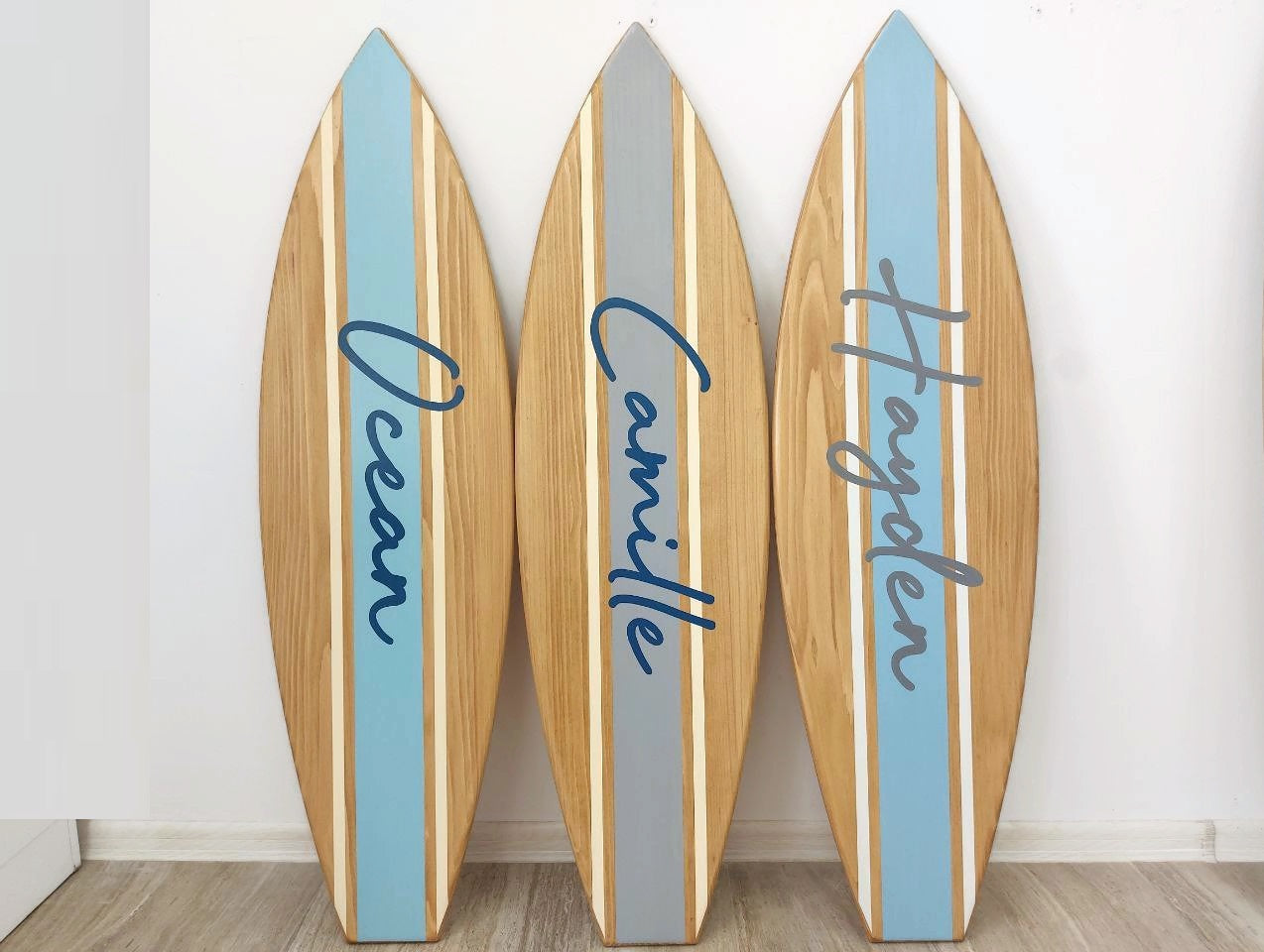 Handmade decorative surfboard wall art with personalized details