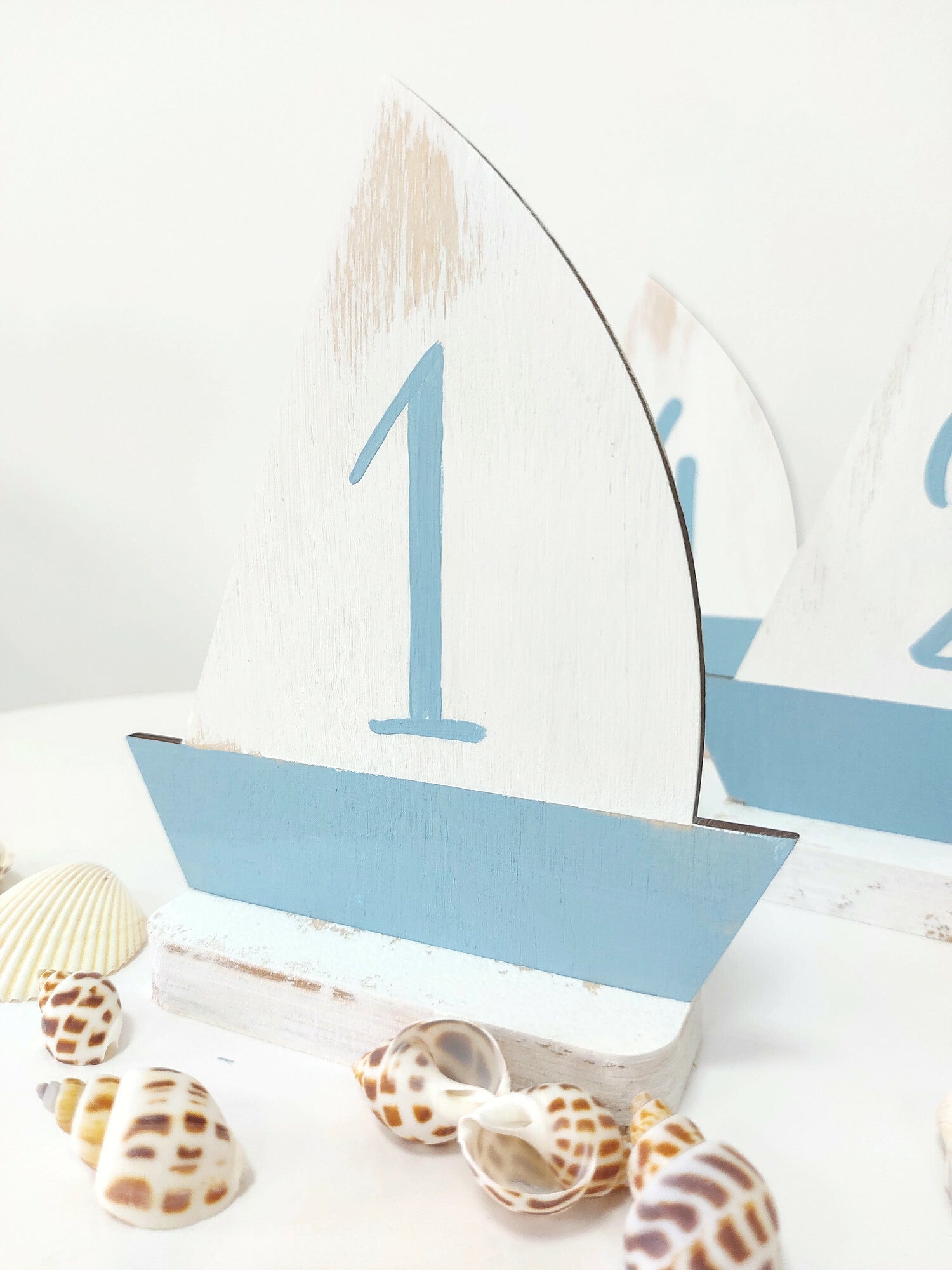 Coastal interior design beach house decoration wooden table numbers