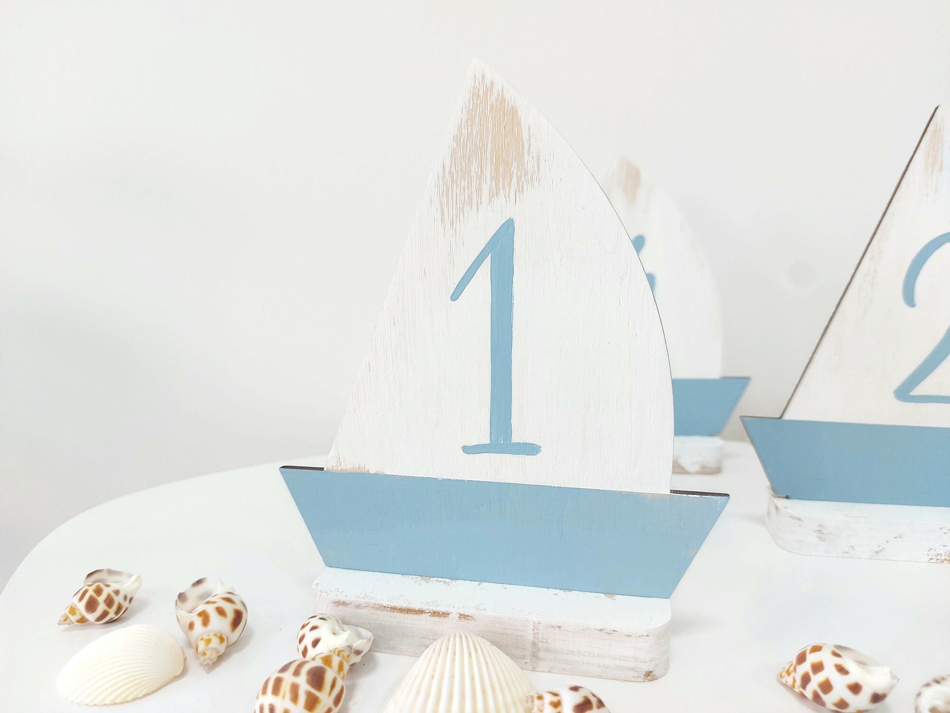 Nautical wedding decorations sailboat table numbers on reception table