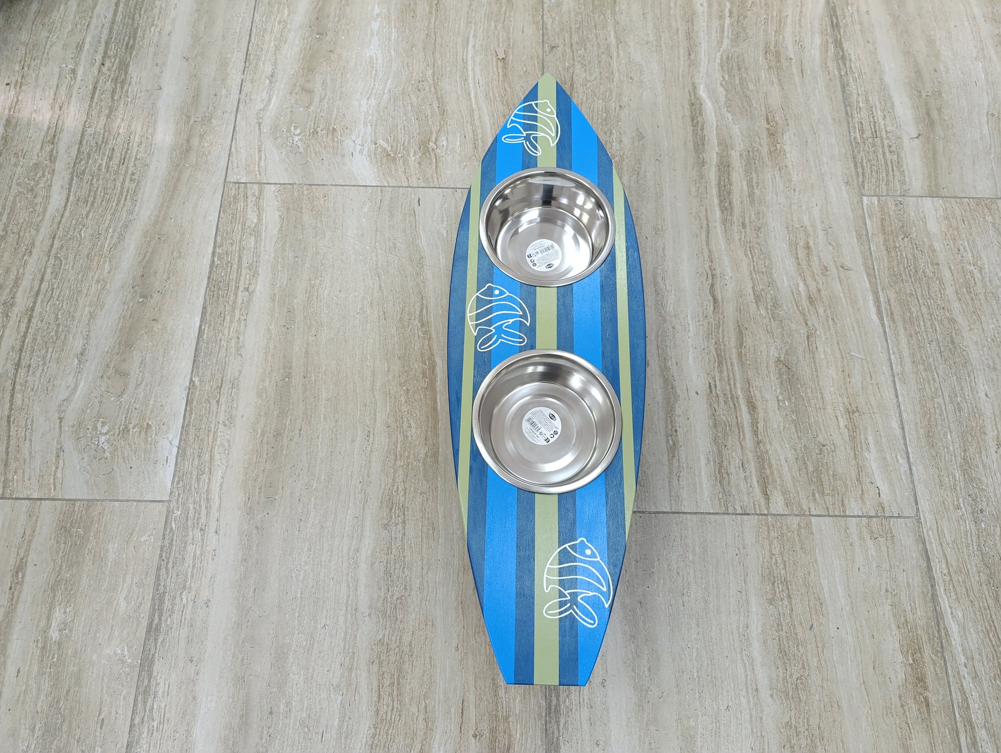 Handmade surfboard feeding station for pets with stainless bowls