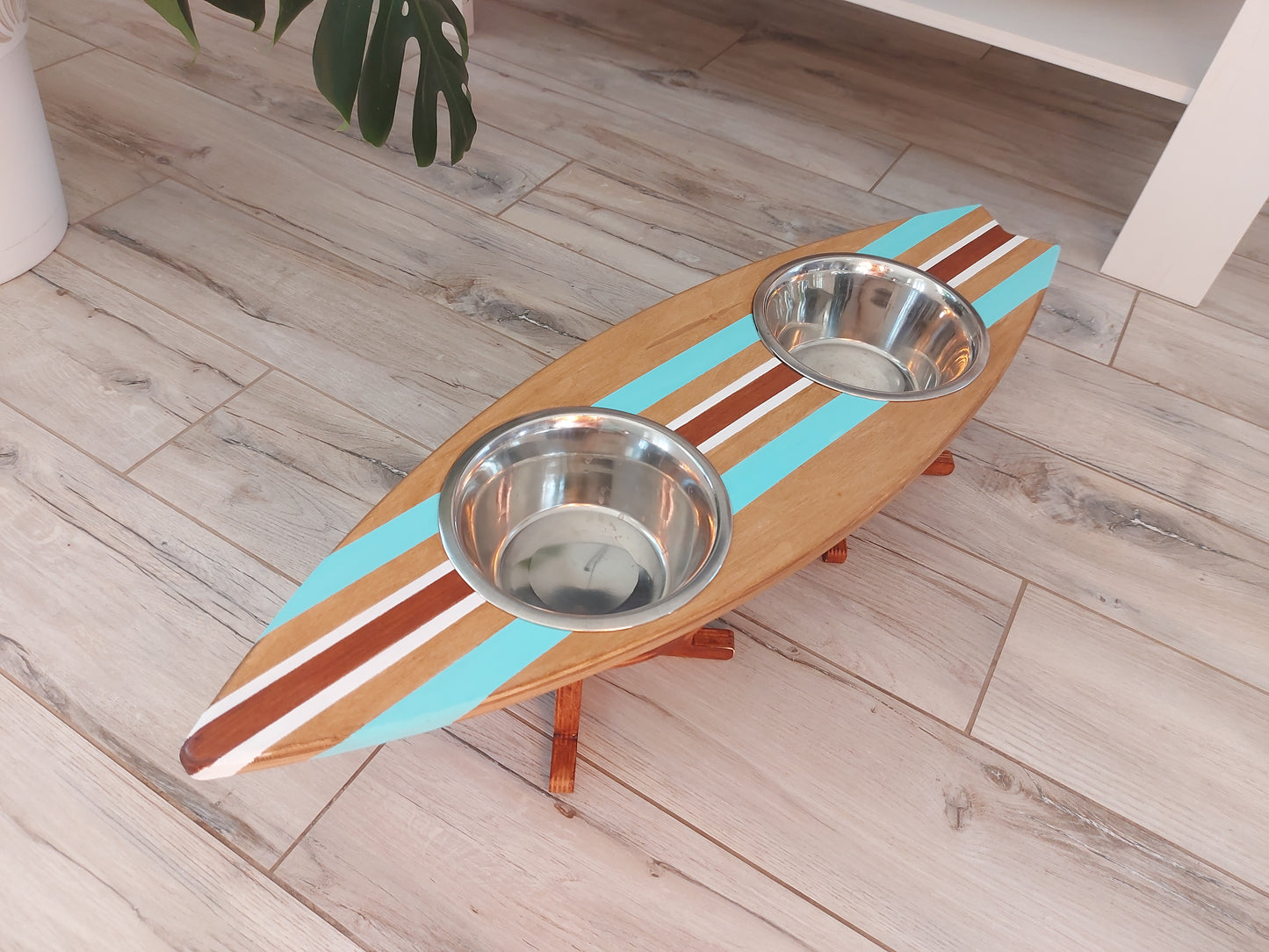 Wooden surfboard dog feeding stand with stainless pet bowls