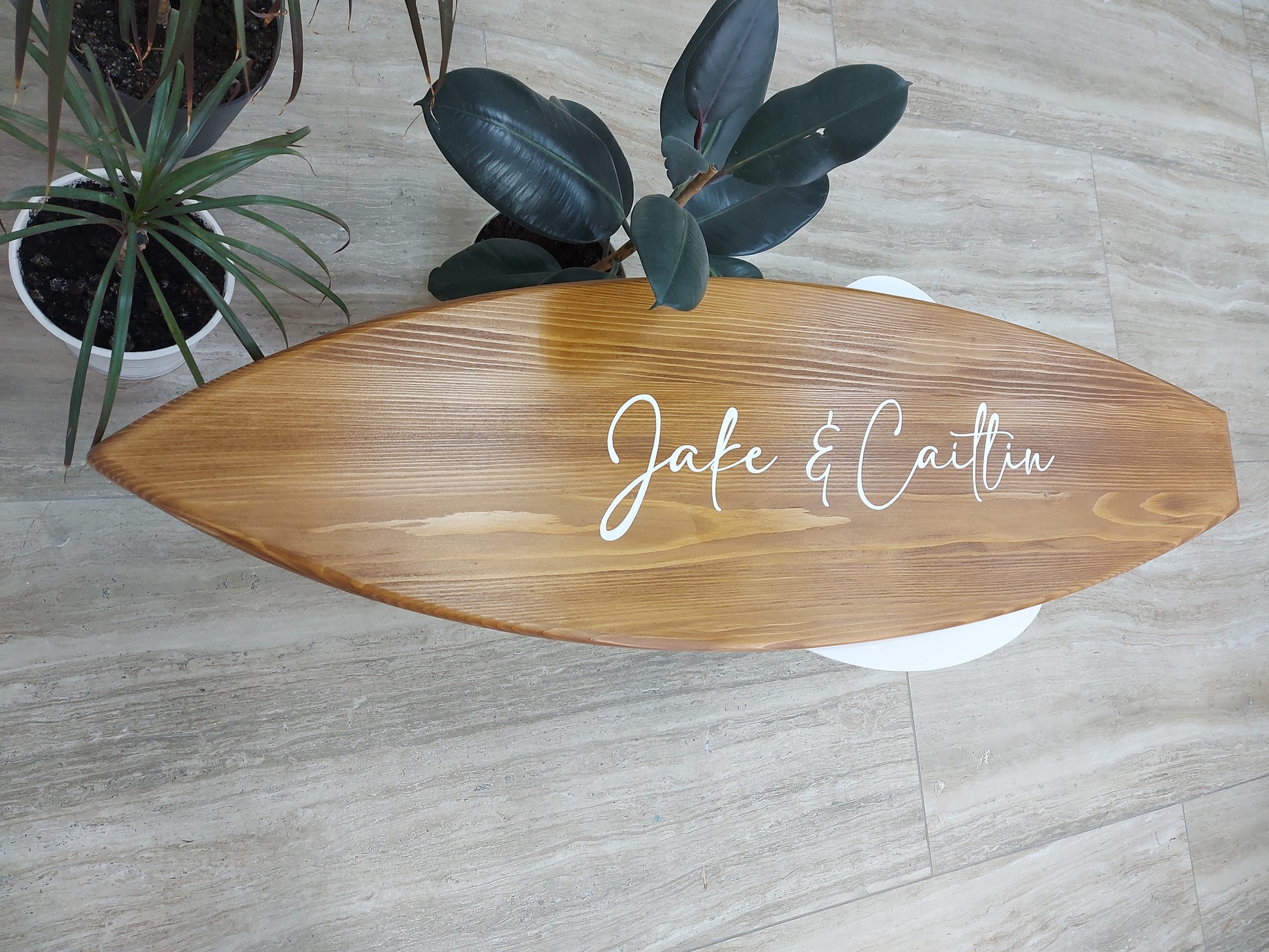 Alternative wedding guest book surfboard designed for the wedding reception table