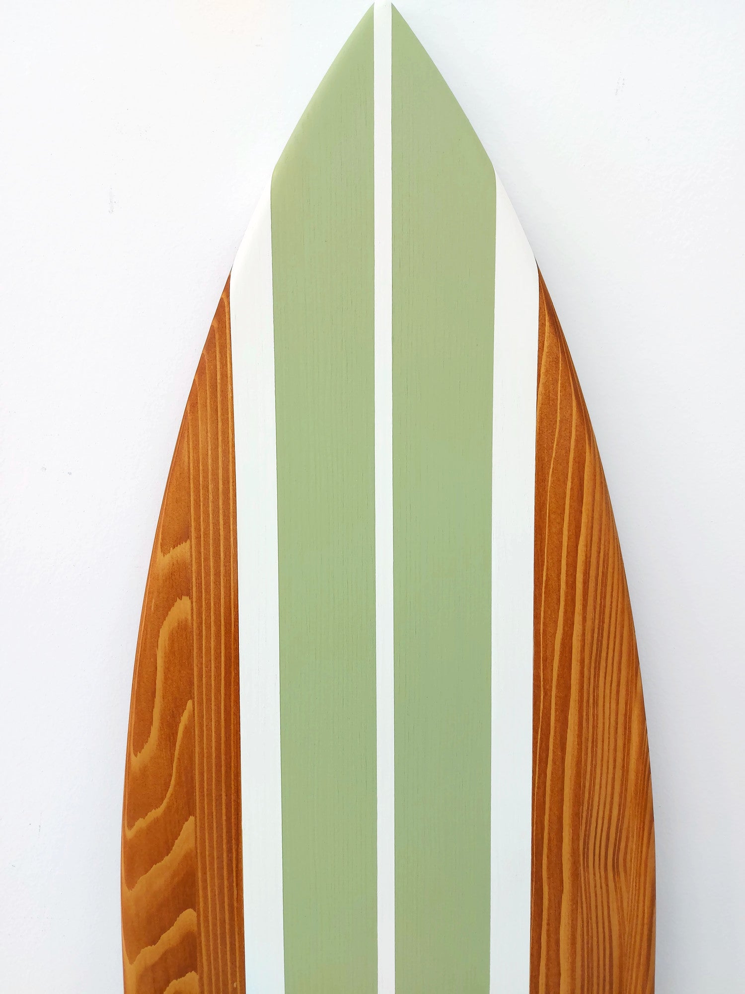 Custom surfboard sign wooden décor in coastal living area