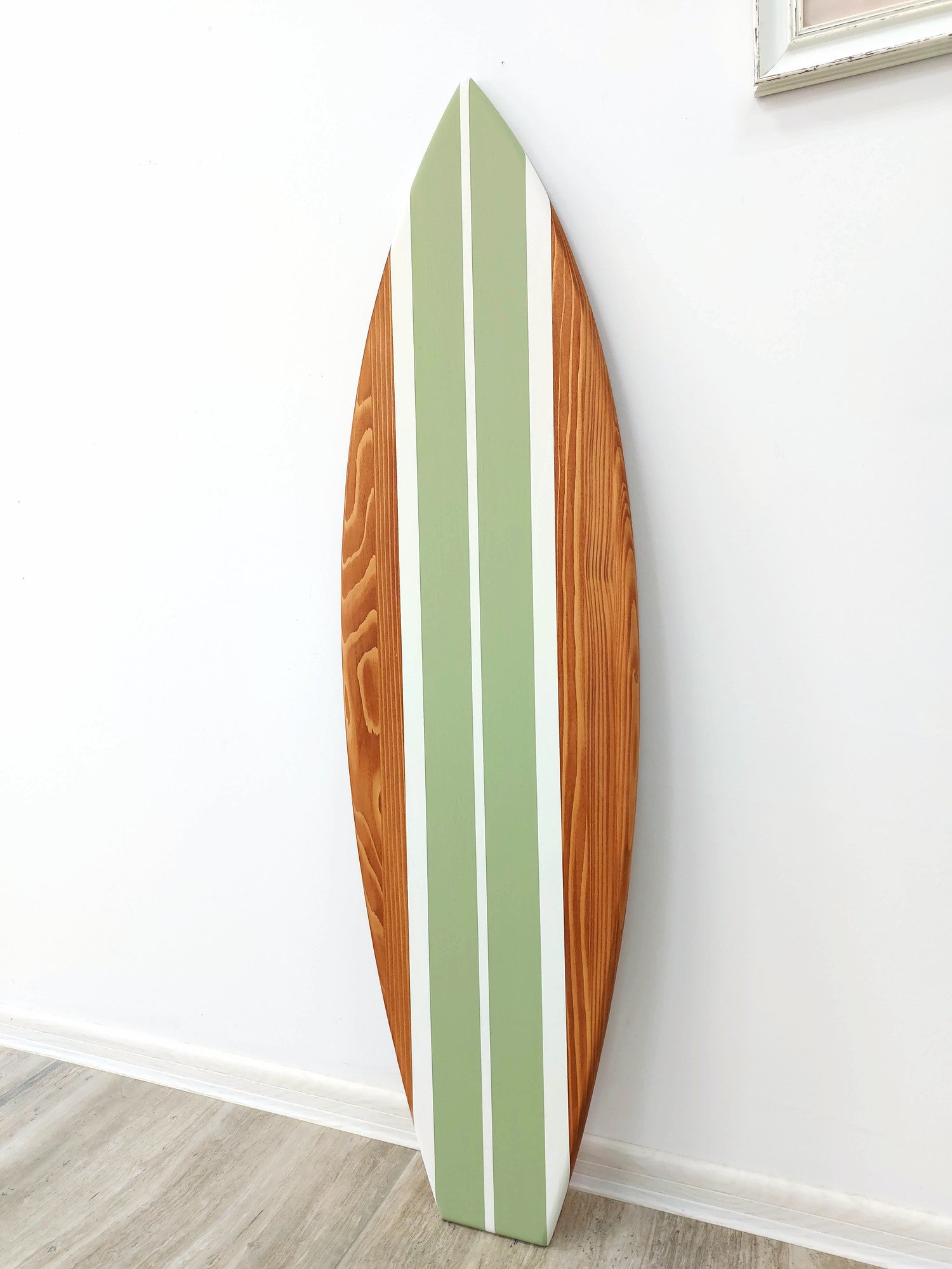 Surfboard wall décor beach house style with wood texture
