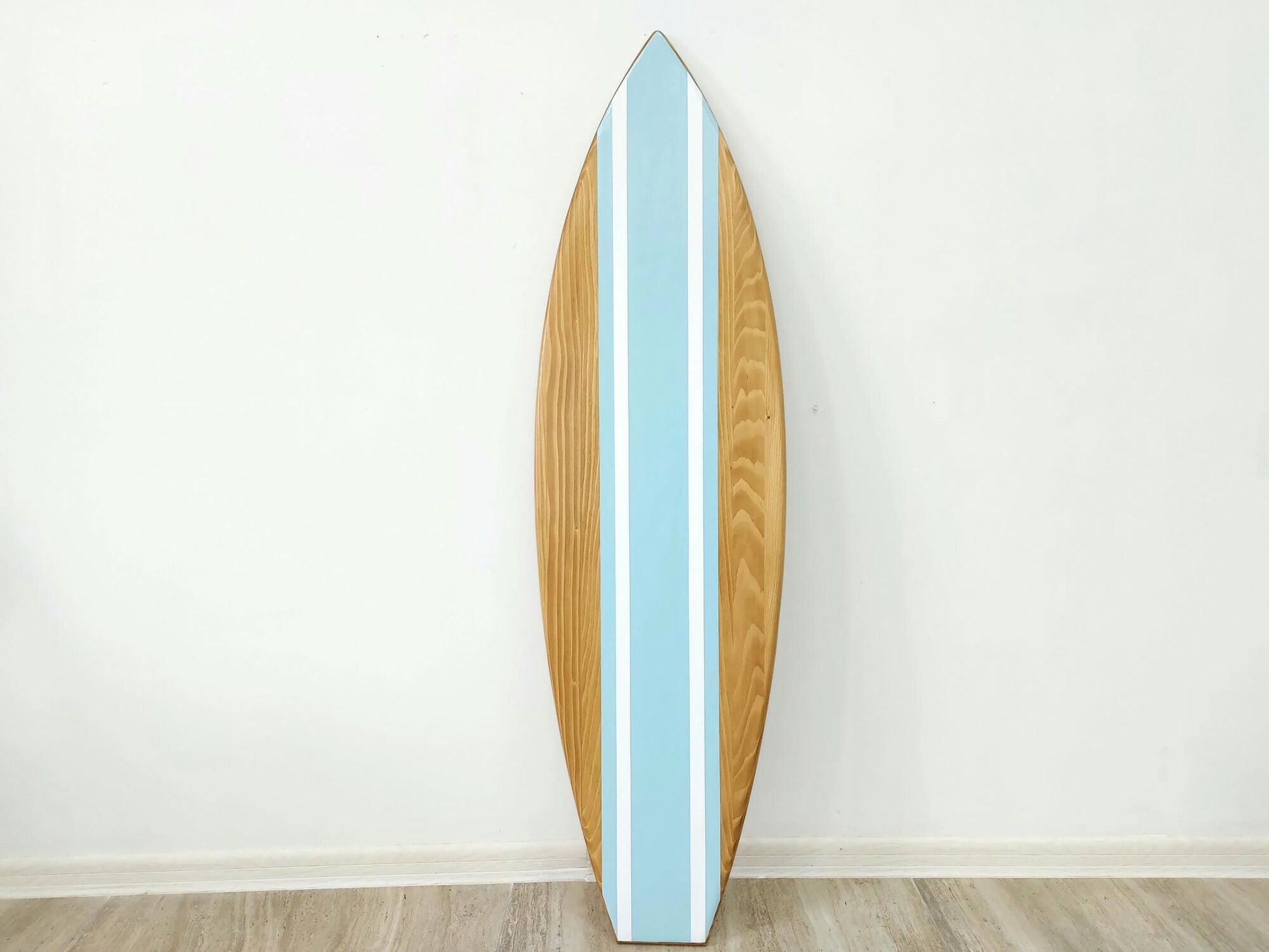 Personalized surfboard beach décor hanging on wall