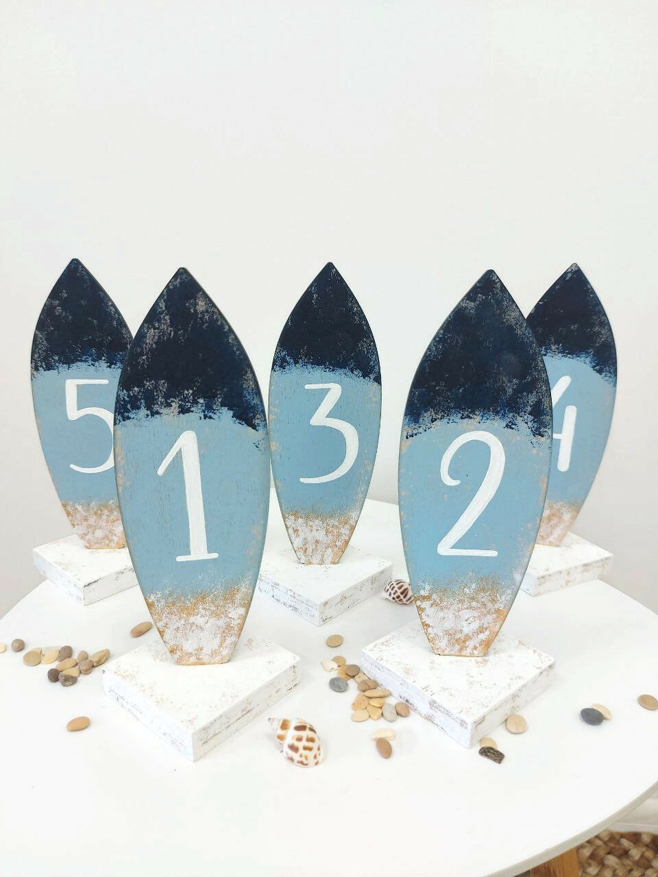Coastal interior design wedding table numbers wood beach house decor
