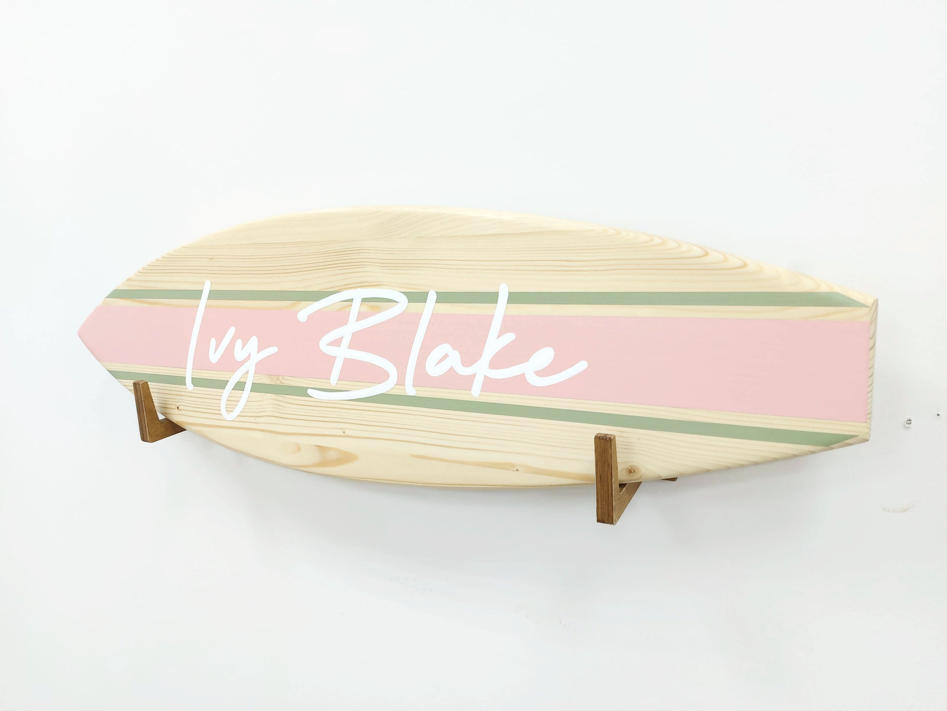 Handmade decorative surfboard name sign for coastal interiors