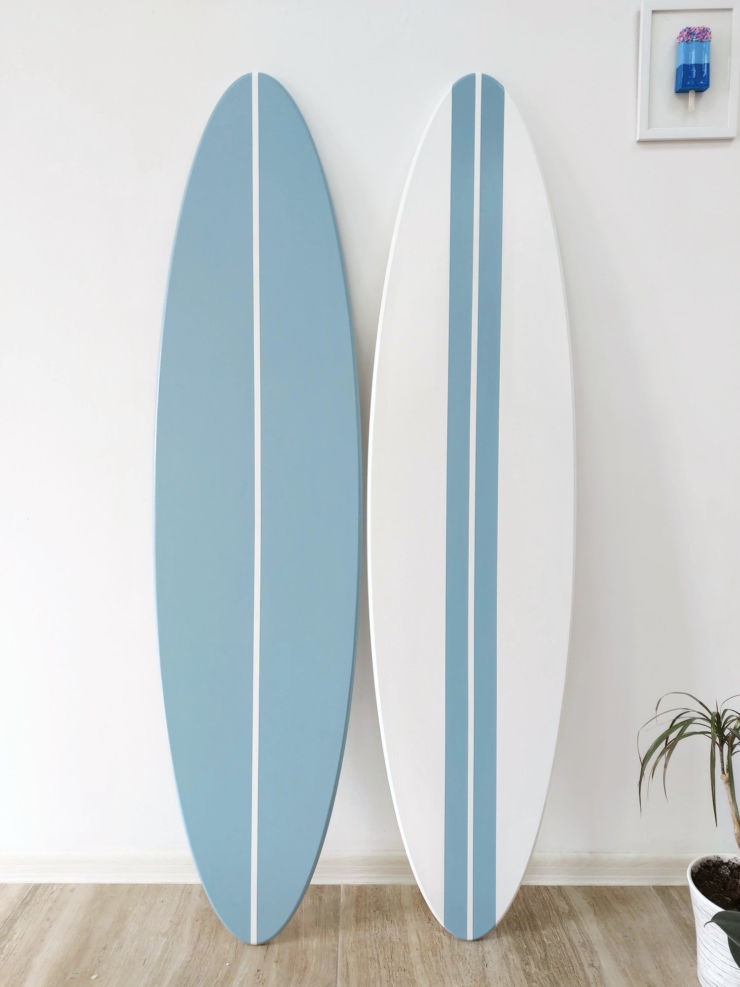 Handcrafted wood surfboard wall décor in coastal room