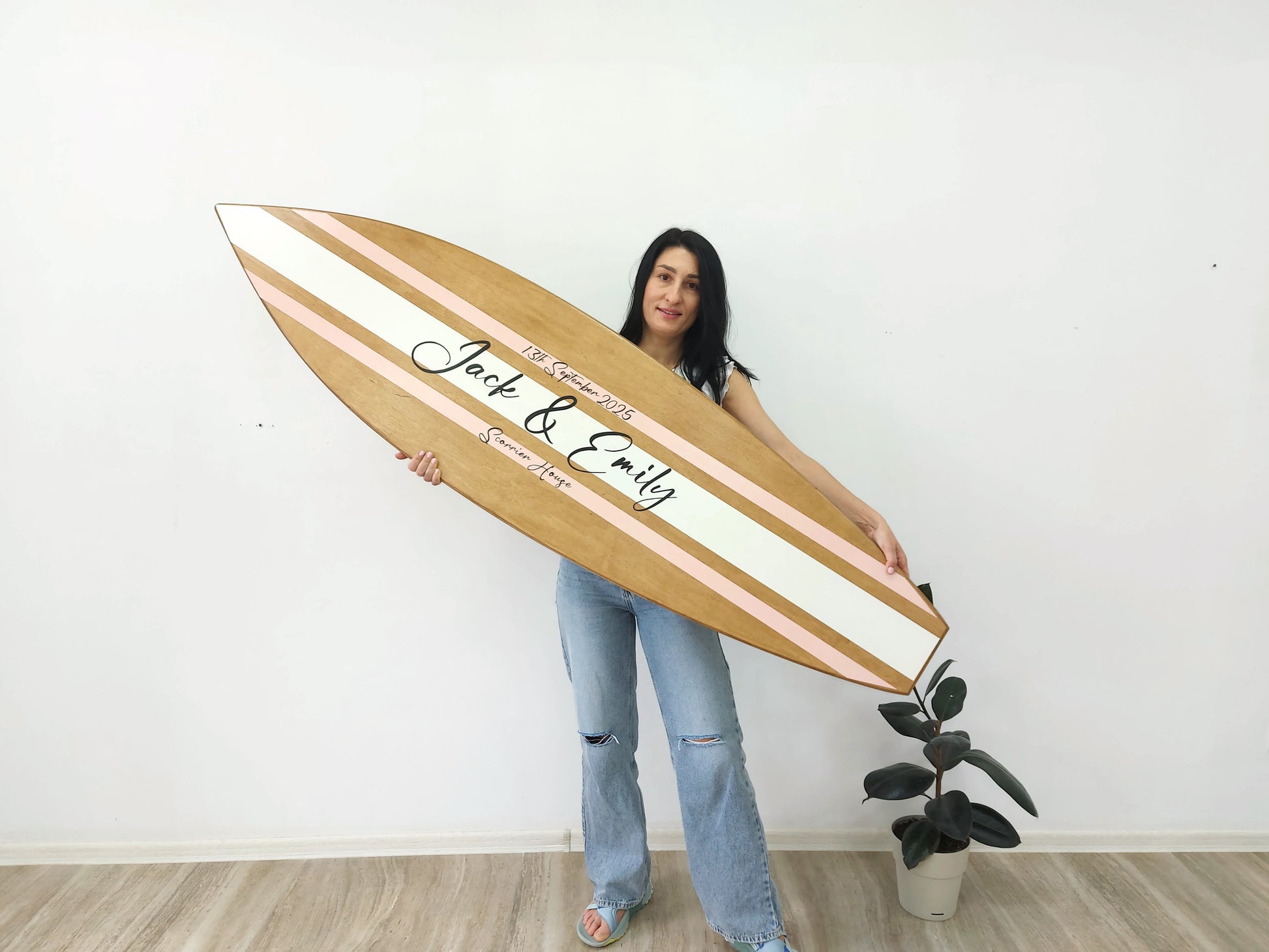 Different sizes of wooden surfboard wedding guest sign-in options