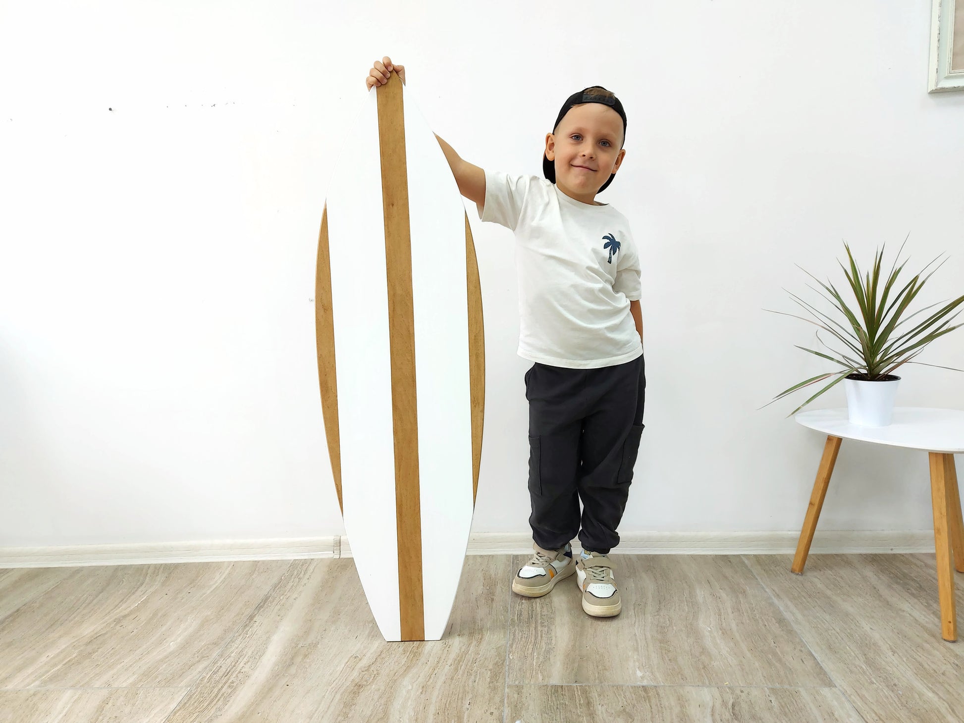 Wooden surfboard wall art for coastal home decor